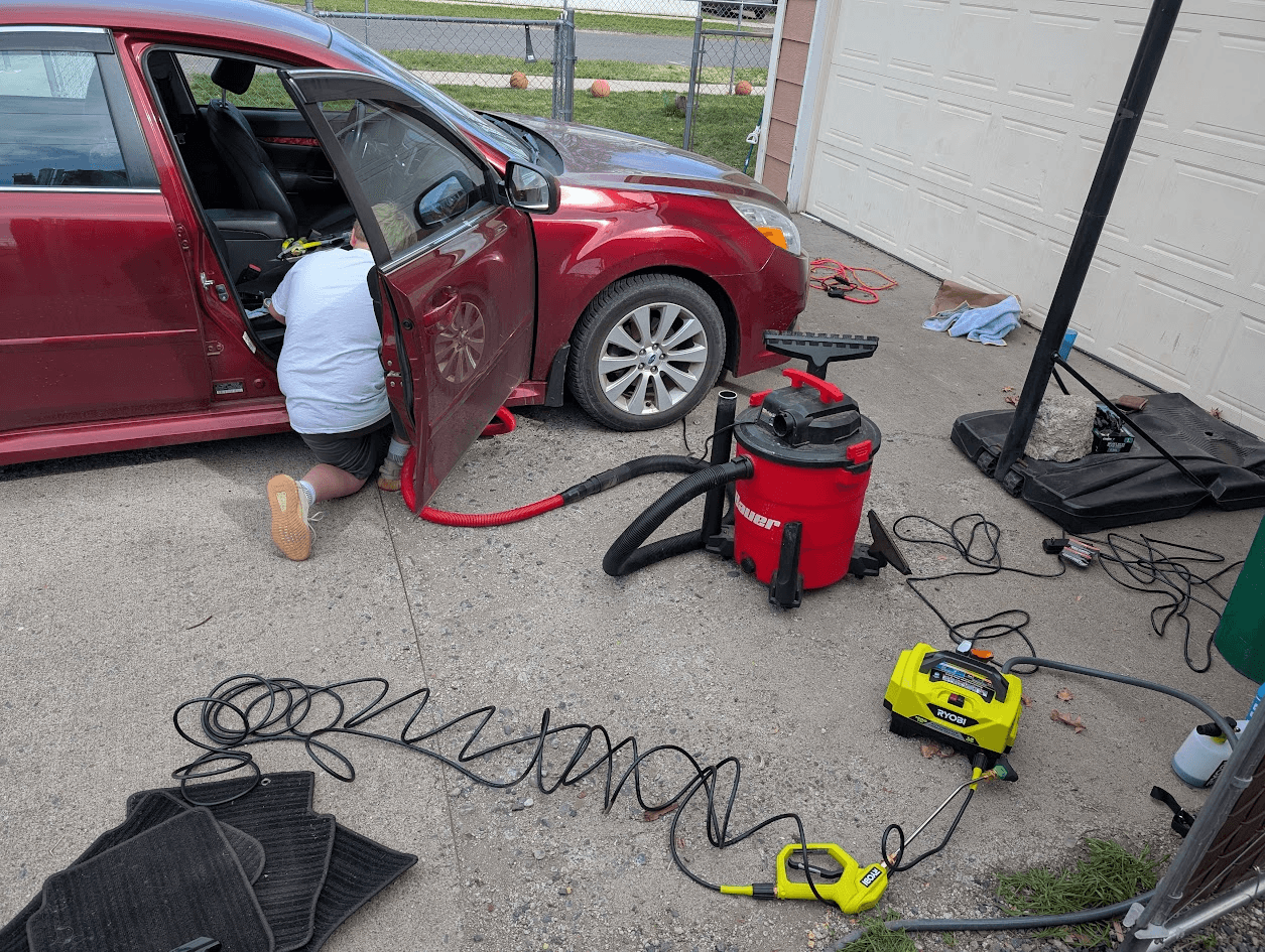 Whacko deep cleaning the interior with a wet/dry vac